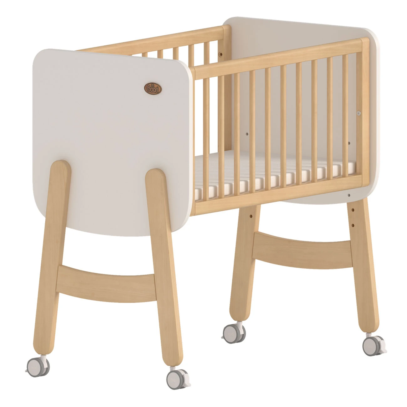 Compact baby cot supplier providing portable wooden mini crib with lockable wheels for urban nurseries. Compact baby cot supplier providing portable wooden mini crib with lockable wheels for urban nurseries.